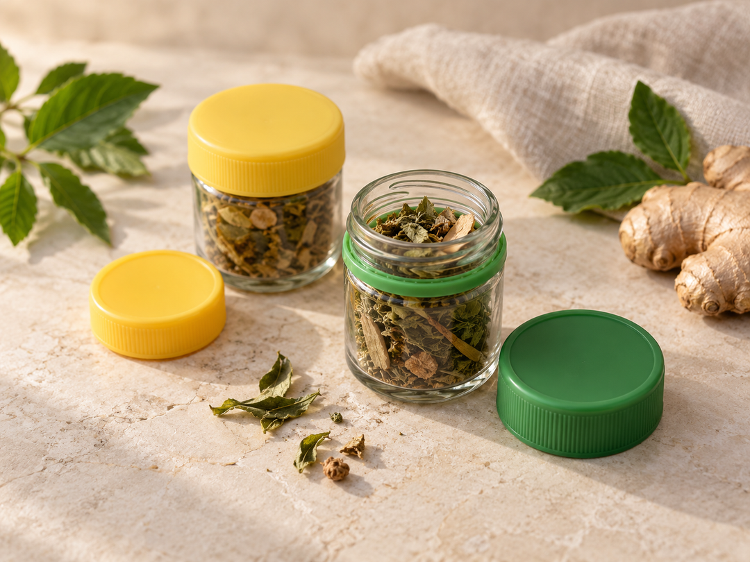 Editorial illustration: Two small plain herbal inhaler jars, one green-lidded and one yellow-lidded, one open showing dried herbs, with their lids placed neatly nearby.