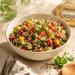 Cooked three-colour quinoa salad serving suggestion
