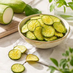 Crispy green radish slices in a serving bowl