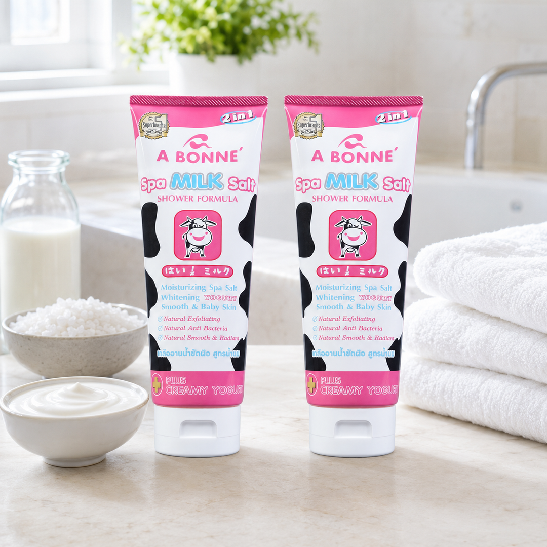 Two A BONNE Coffee Milk body scrub tubes with coffee beans, milk and spa salt