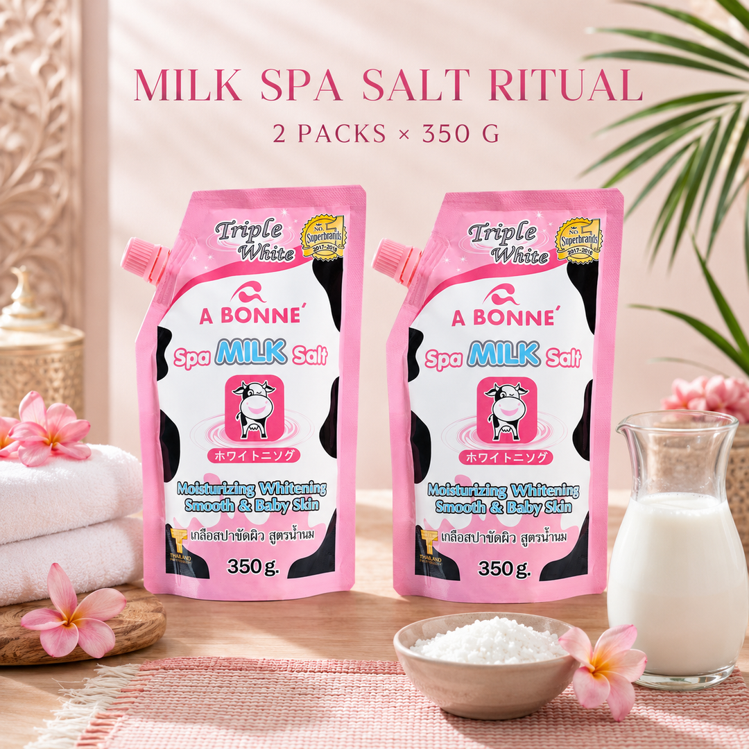Two A BONNE Spa Milk Salt pouches in a Thai-inspired spa setting
