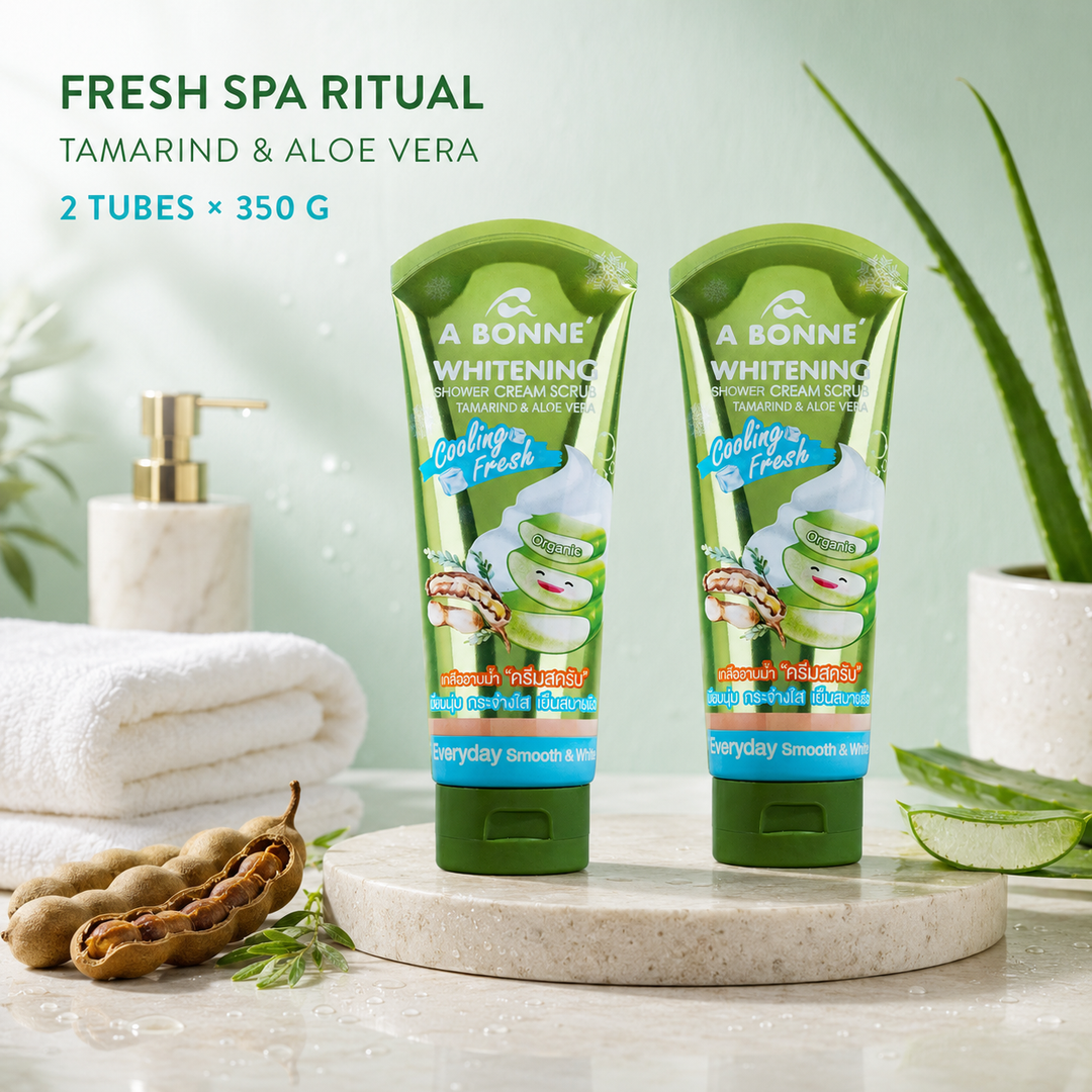 Two A BONNE Cooling Fresh Shower Cream Scrub tubes in a fresh spa setting