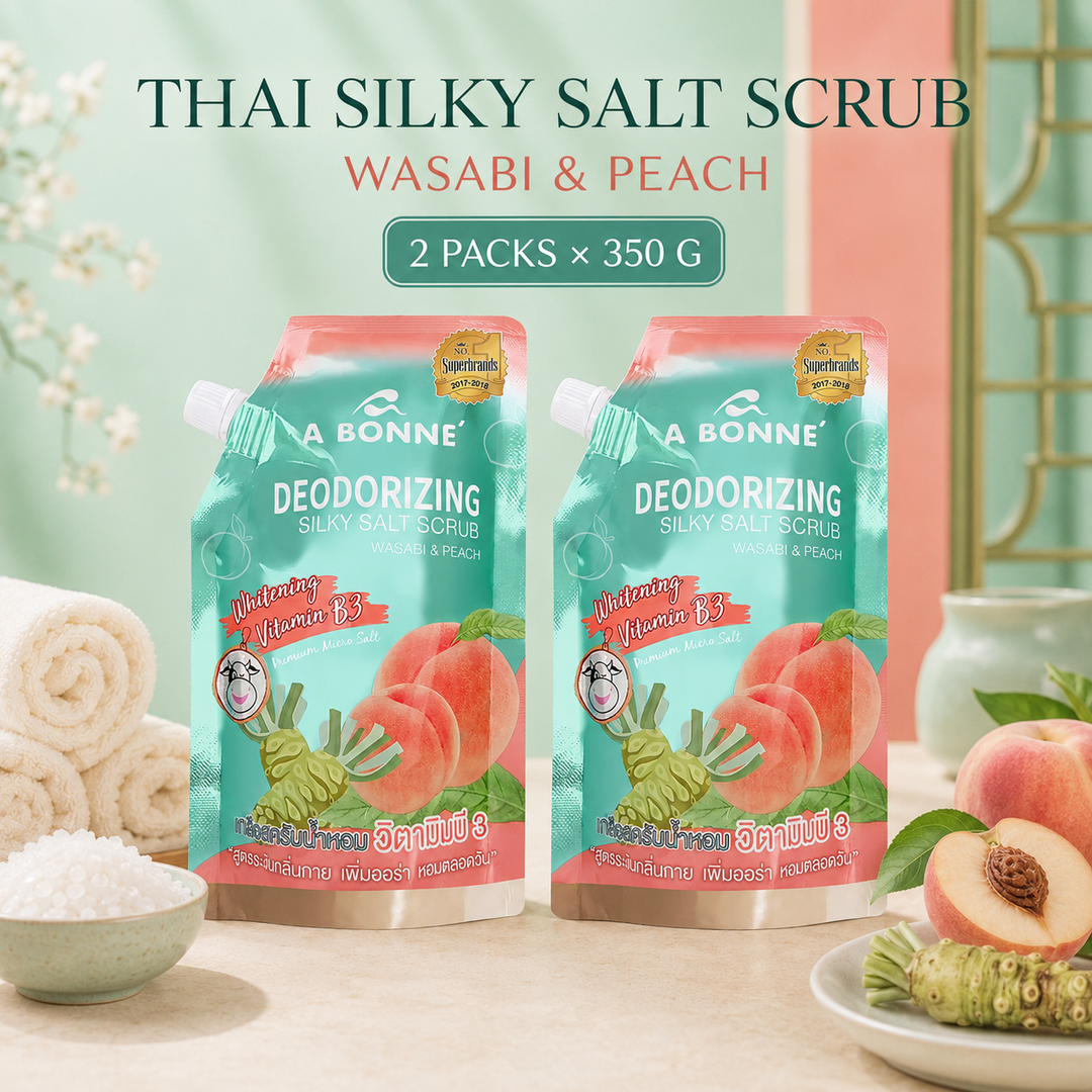 Two A BONNE Wasabi and Peach Silky Salt Scrub pouches in a fresh spa setting