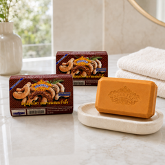 Two boxes and one bar of ASANTEE Tamarind and Honey Herbal Soap in a bright bathroom