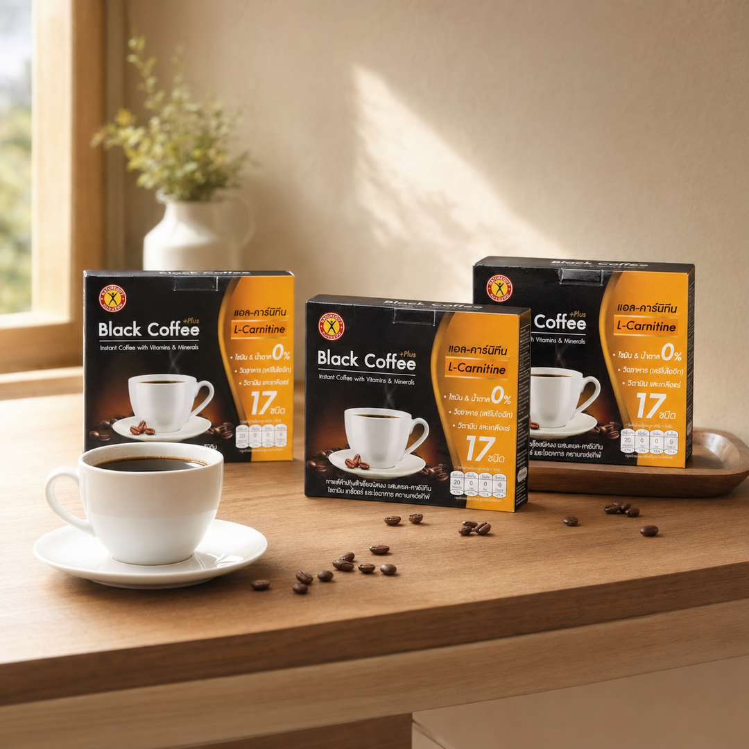 Three NatureGift Black Coffee L-Carnitine boxes with a cup of black coffee