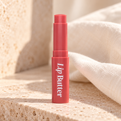 beWiLD Lip Butter, shade 01 Red Yam, on a sunlit beauty vanity