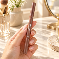 beWiLD Eyebrow Pro Line, shade 01 Toffee Nut, held in a hand at a beauty vanity