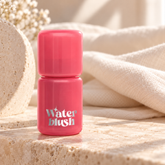 beWiLD Dewy Liquid Water Blush, shade 01 Sunset Rose, on a sunlit beauty vanity