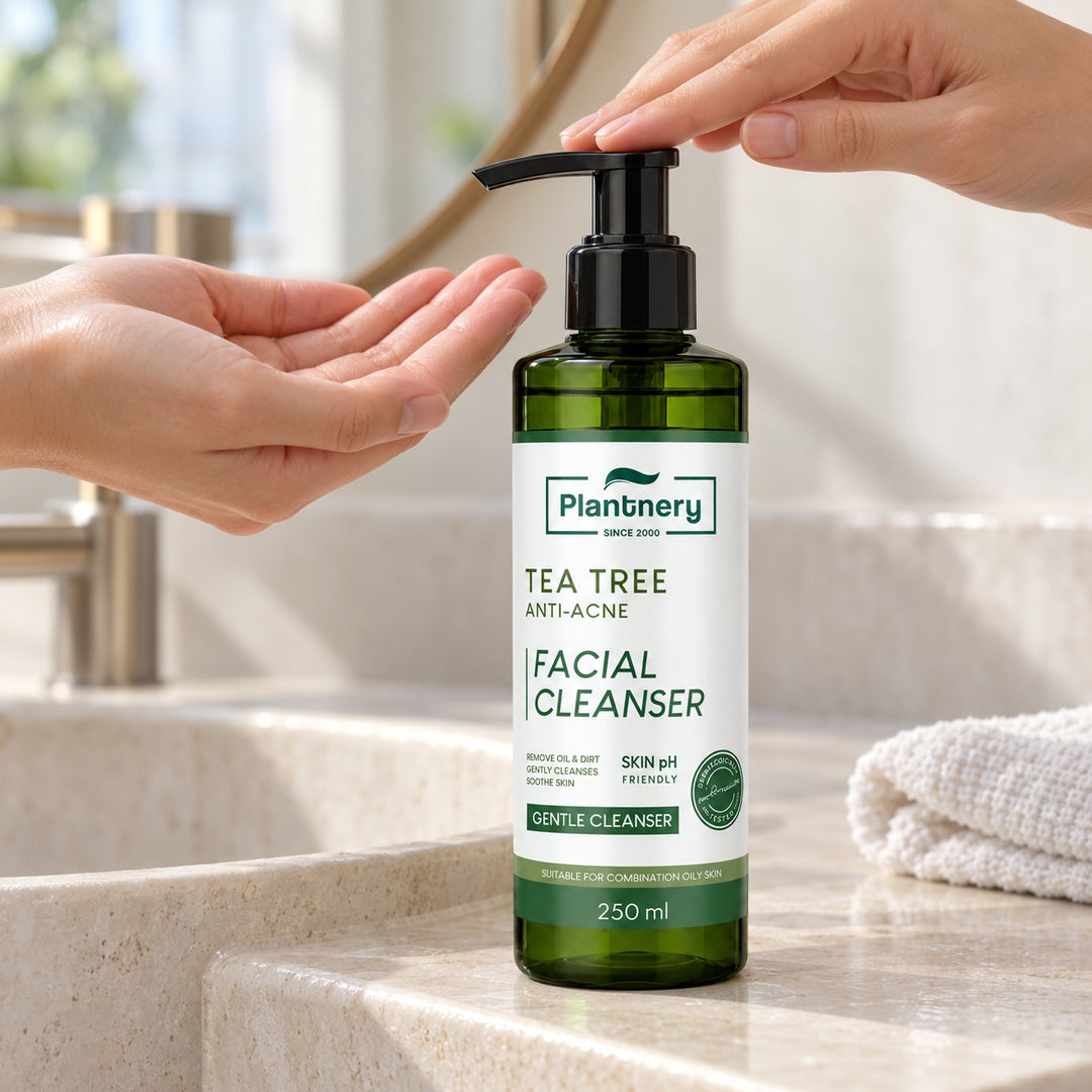 Using the pump of Plantnery Tea Tree Facial Cleanser 250 ml beside a washbasin
