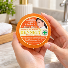 Bennett Classic Herb Carrot & Vitamin B3 Cleansing Soap — 160 g — held in hands