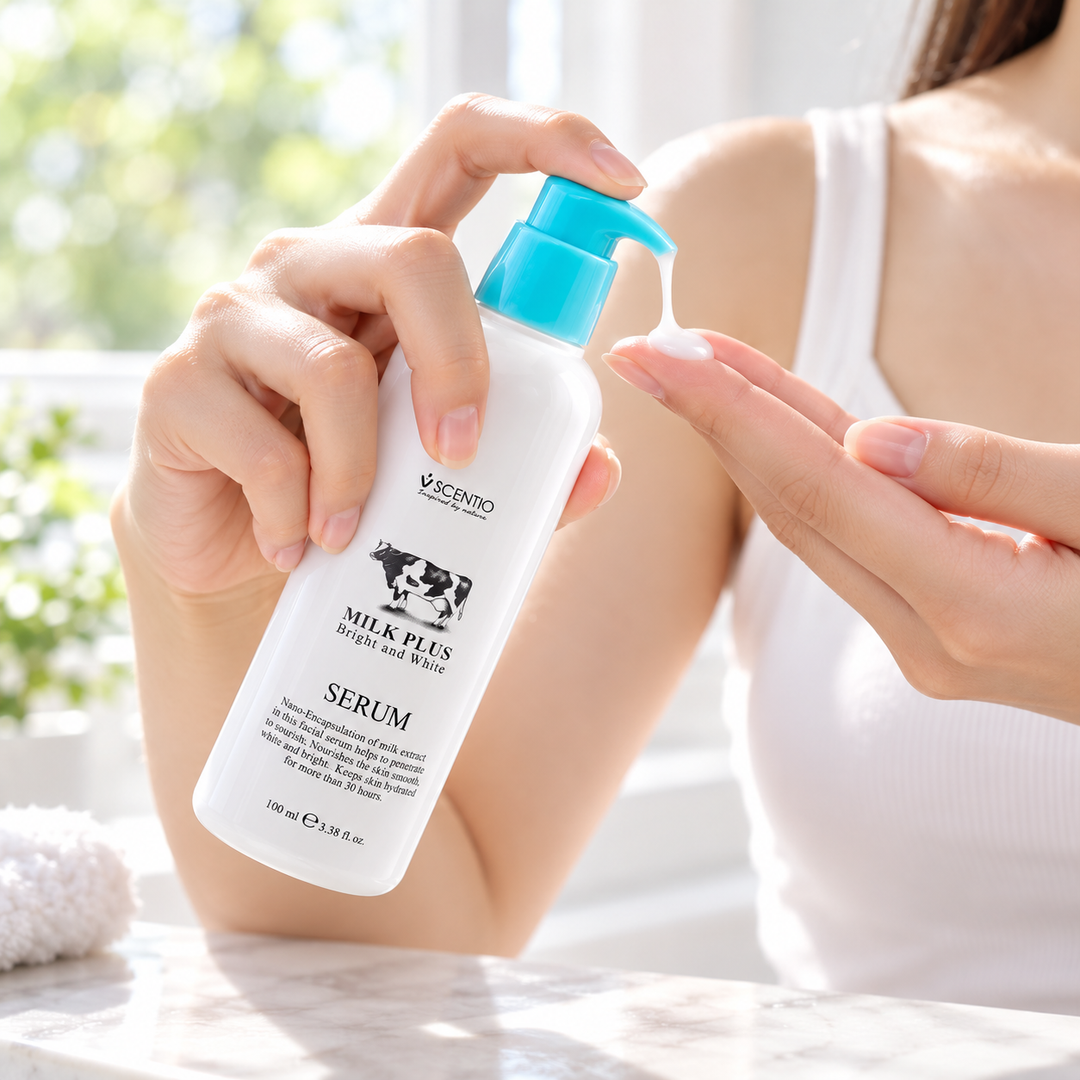 Scentio Milk Plus Bright And Smooth Serum 100 ml — serum being dispensed into a hand