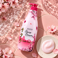 Scentio Cherry Blossom Lightening & Smooth Bath Cream 700 ml — bottle beside blossoms and bath foam