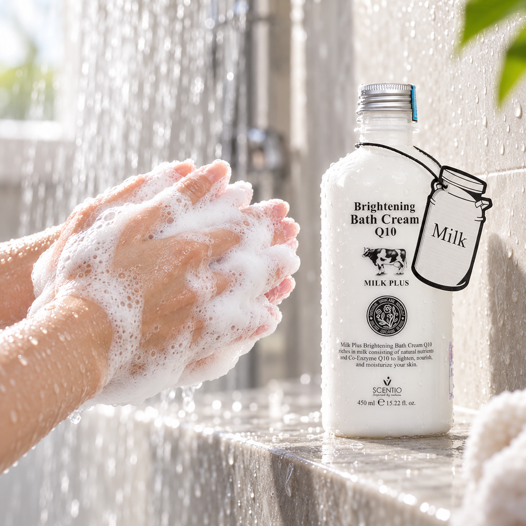 Scentio Milk Plus Bright & White Shower Cream 450 ml — bottle beside lathered hands under running shower water