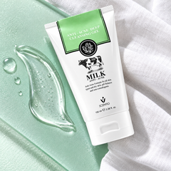 Scentio Milk Anti-Acne Deep Cleansing Gel 100 ml — tube beside cleanser texture and a towel