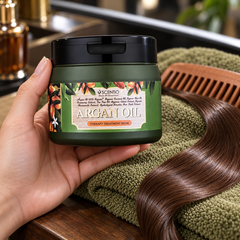 Scentio Hair Professional Argan Oil Therapy Treatment Mask 250 ml — hair mask jar held beside a comb and hair