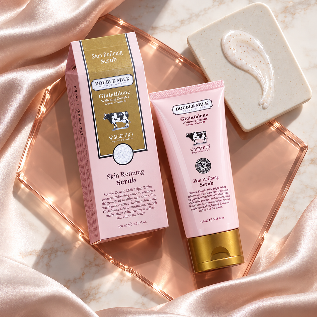 Scentio Double Milk Triple White Skin Refining Scrub 100 ml — tube and carton beside scrub texture on satin