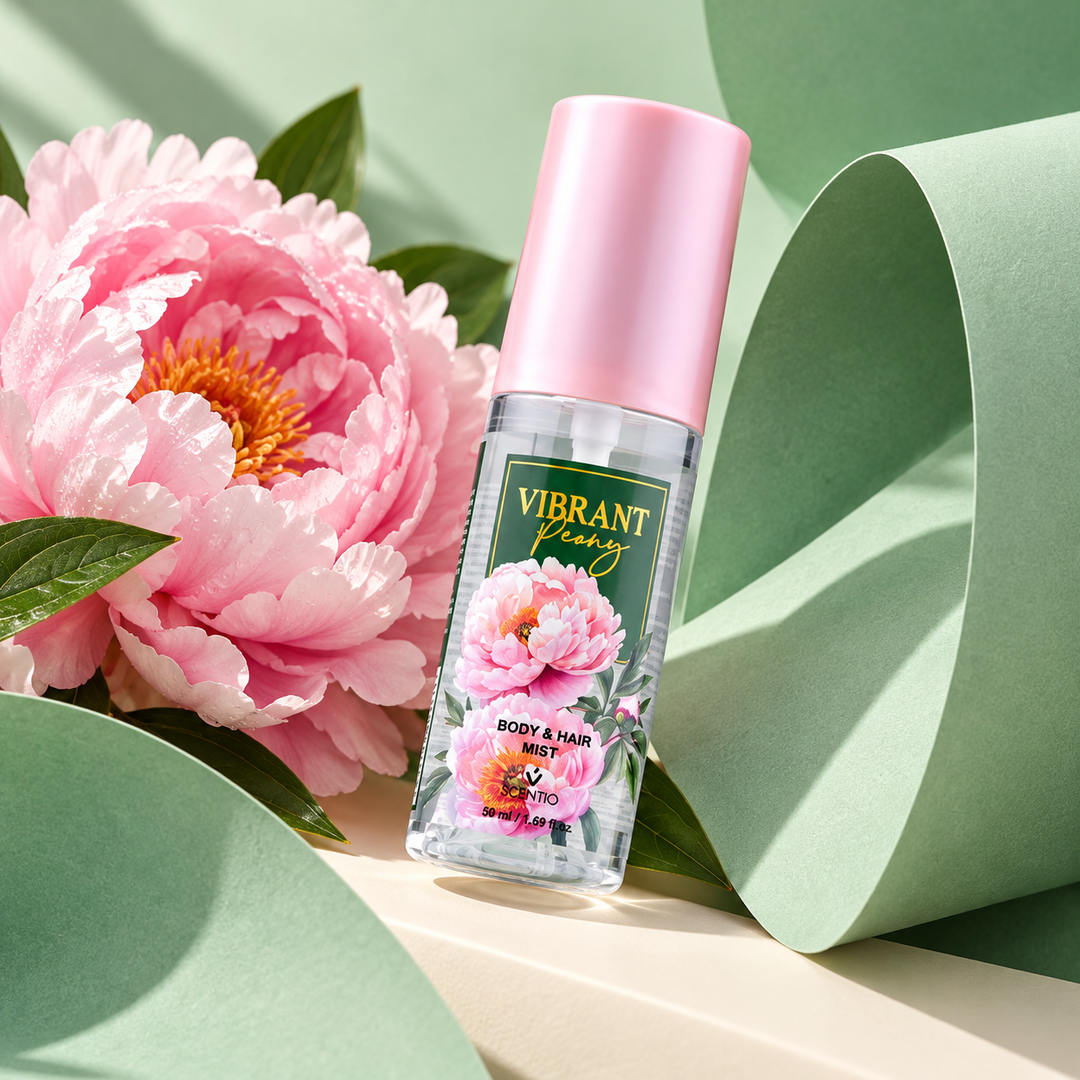 Scentio Vibrant Peony Body & Hair Mist 50 ml — mist bottle beside peonies and green ribbon