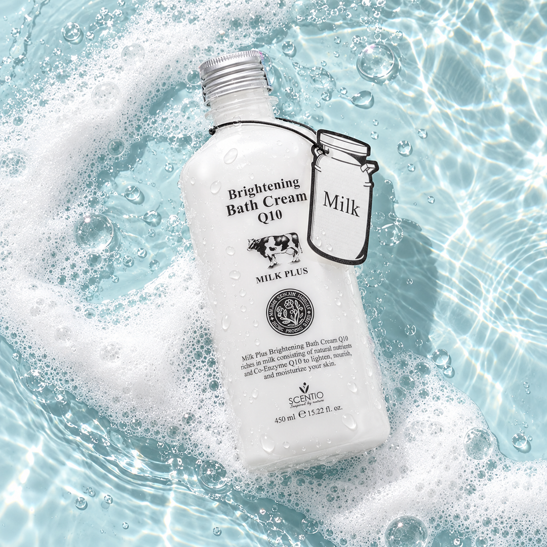 Scentio Milk Plus Bright & White Shower Cream 450 ml — bottle surrounded by water and foam