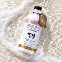 Scentio Double Milk Triple White Bath Cream 350 ml — bottle surrounded by water and bath foam