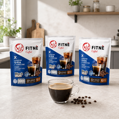 Three packs of FITNÉ Strawberry Herbal Infusion with prepared herbal tea and strawberries