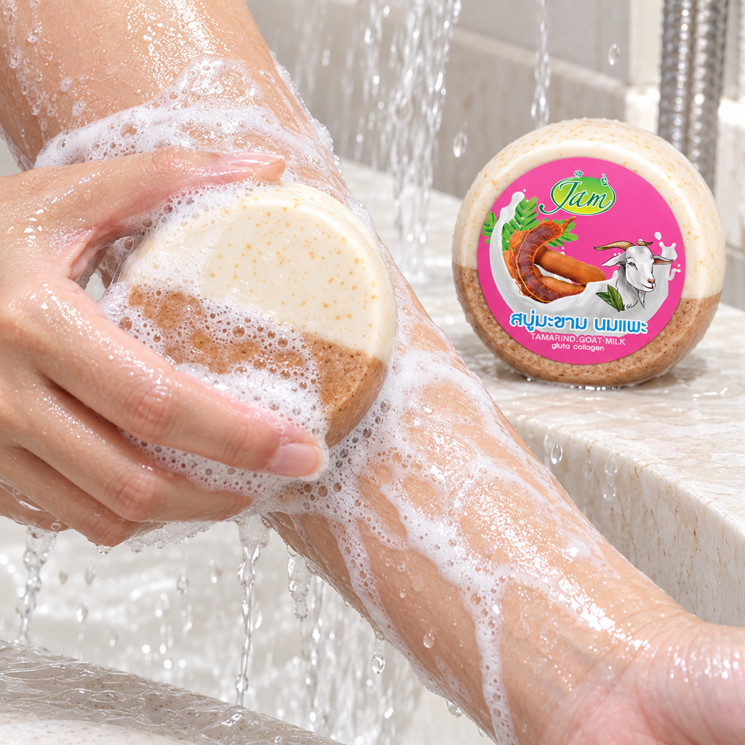 JAM Tamarind Goat Milk Collagen Round Soap used on a wet forearm