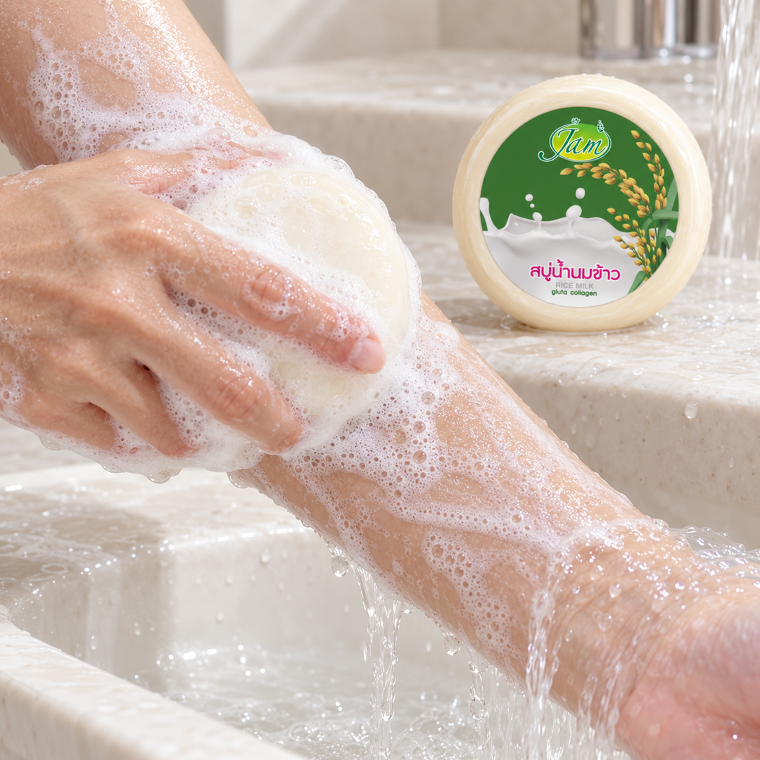 JAM Rice Milk Gluta Collagen Round Soap used on a wet forearm