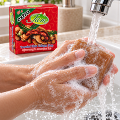 JAM Tamarind Gluta Collagen soap lathered under running water