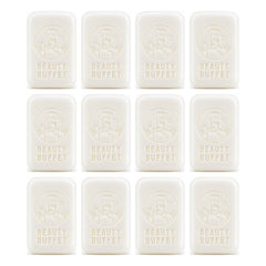 Beauty Buffet Milk Plus Brightening Q10 Face & Body Soap — 12 × 100 g Bars — exactly 12 retail units shown on white background.