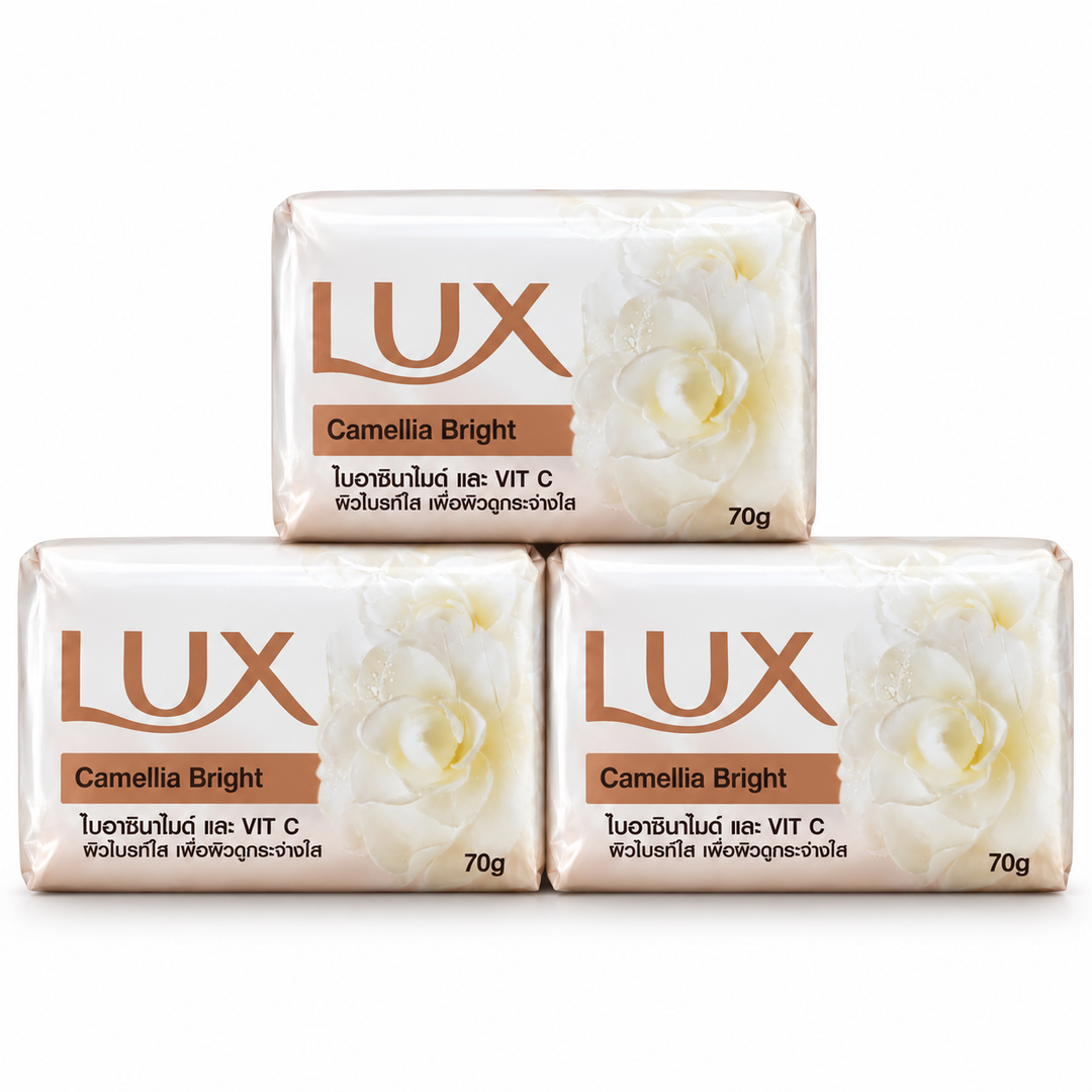Three wrapped LUX Camellia Bright soap bars, 70 g each, on white