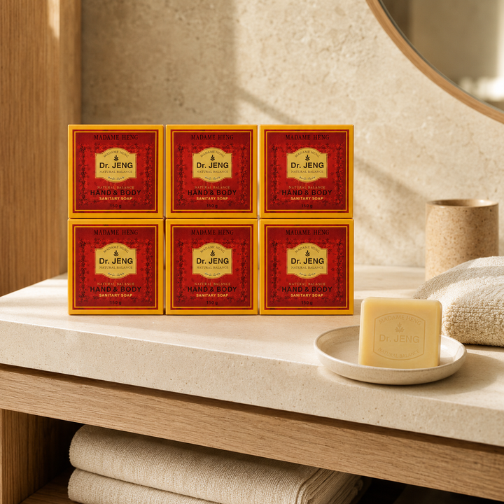 Six Madame Heng Dr. JENG 150 g soap boxes arranged on a premium bathroom shelf