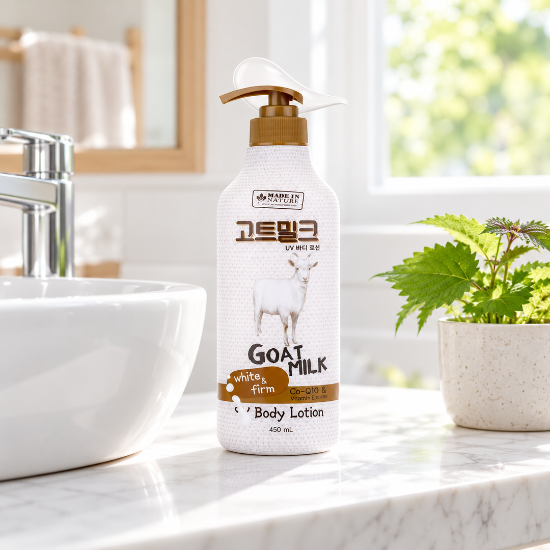 Made in Nature Goat Milk UV Body Lotion 450 ml beside a white bathroom sink and green plant