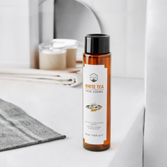 Naturista white tea facial essence 220ml — product lifestyle photograph