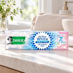 Darlie All Shiny White Enzyme Floral Fresh Toothpaste 120 g — one individual retail unit in a bathroom setting; props not included