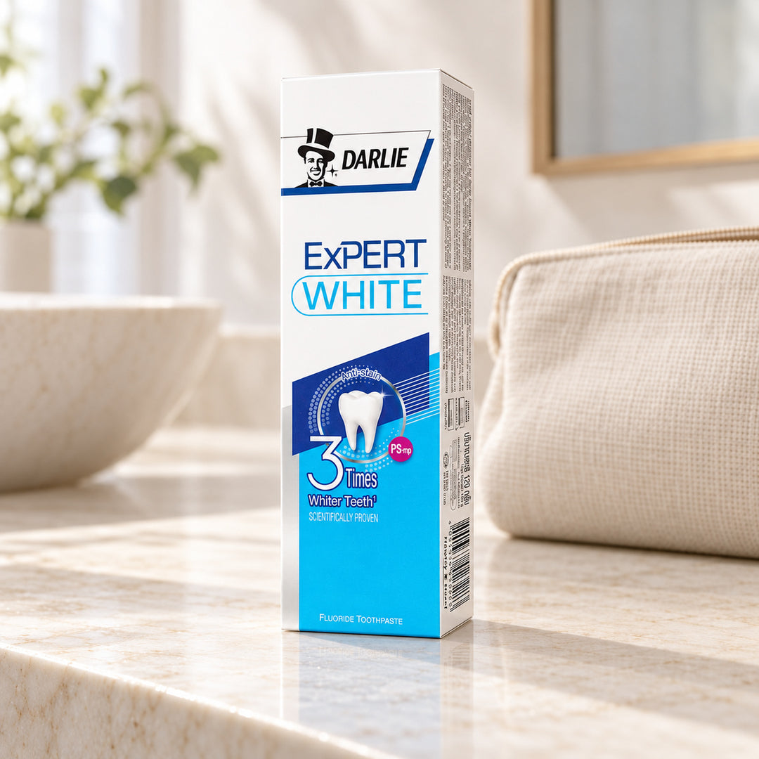 Darlie Expert White Toothpaste 120 g — one individual retail unit in a bathroom setting; props not included