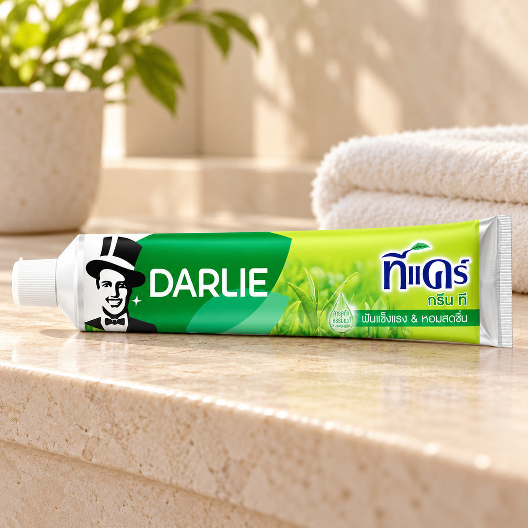 Darlie Tea Care Green Tea Toothpaste 140 g — one individual retail unit in a bathroom setting; props not included