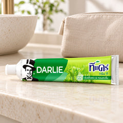 Darlie Tea Care Green Tea Toothpaste 140 g — one individual retail unit in a bathroom setting; props not included