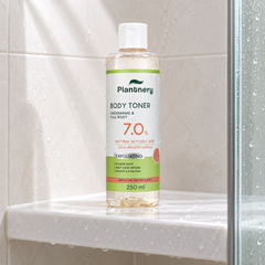 Plantnery Natural Glycolic Body Toner 7% 250 ml on shower shelf
