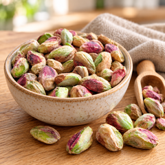 Pistachio kernels in a kitchen bowl — preparation suggestion
