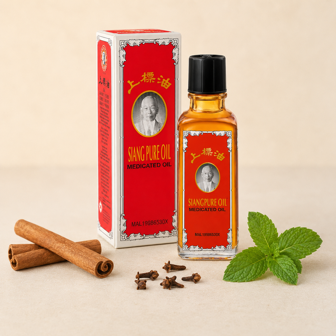 Siang Pure Oil Formula 1 bottle with cinnamon, cloves and peppermint leaves