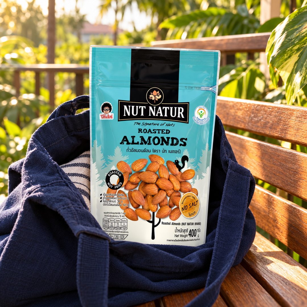 Koh-Kae Nut Natur Roasted Almonds, individual 400 g pouch in a lifestyle scene