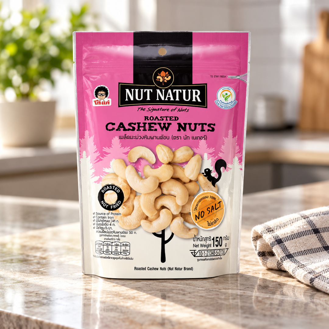 Koh-Kae Nut Natur Roasted Cashew Nuts, individual 150 g pouch in a lifestyle scene