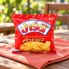 Party Butter Caramel Crispy Sweet Potato Snacks, individual 12 g pouch in a lifestyle scene