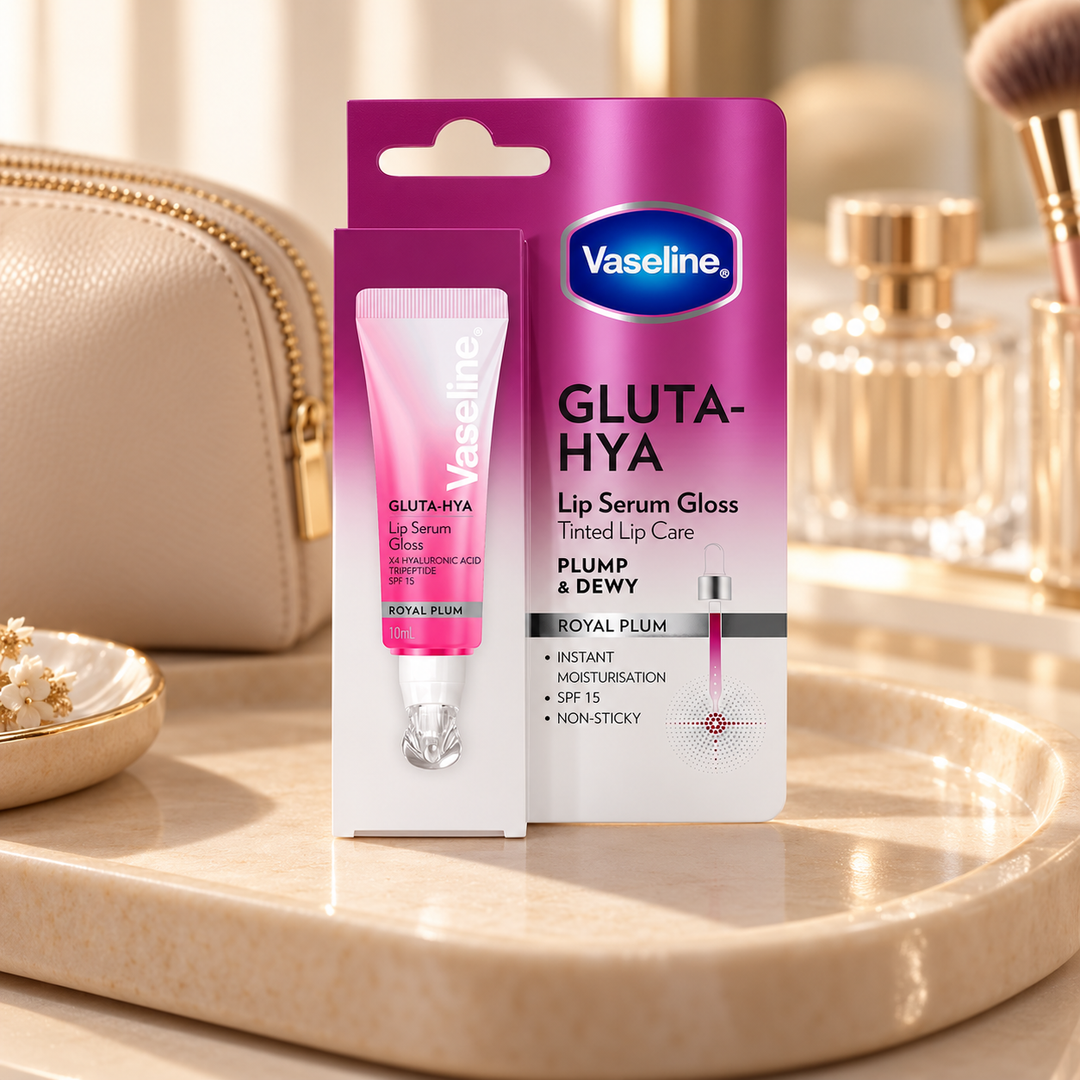 Vaseline Gluta-Hya Lip Serum Gloss Royal Plum on a vanity tray
