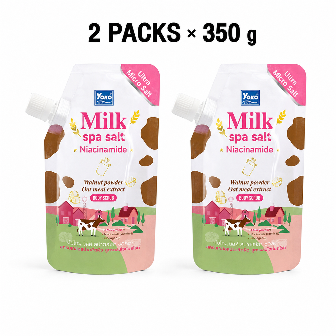 Two 350 g pouches of Yoko Gold Milk Spa Salt Niacinamide Body Scrub on a white background